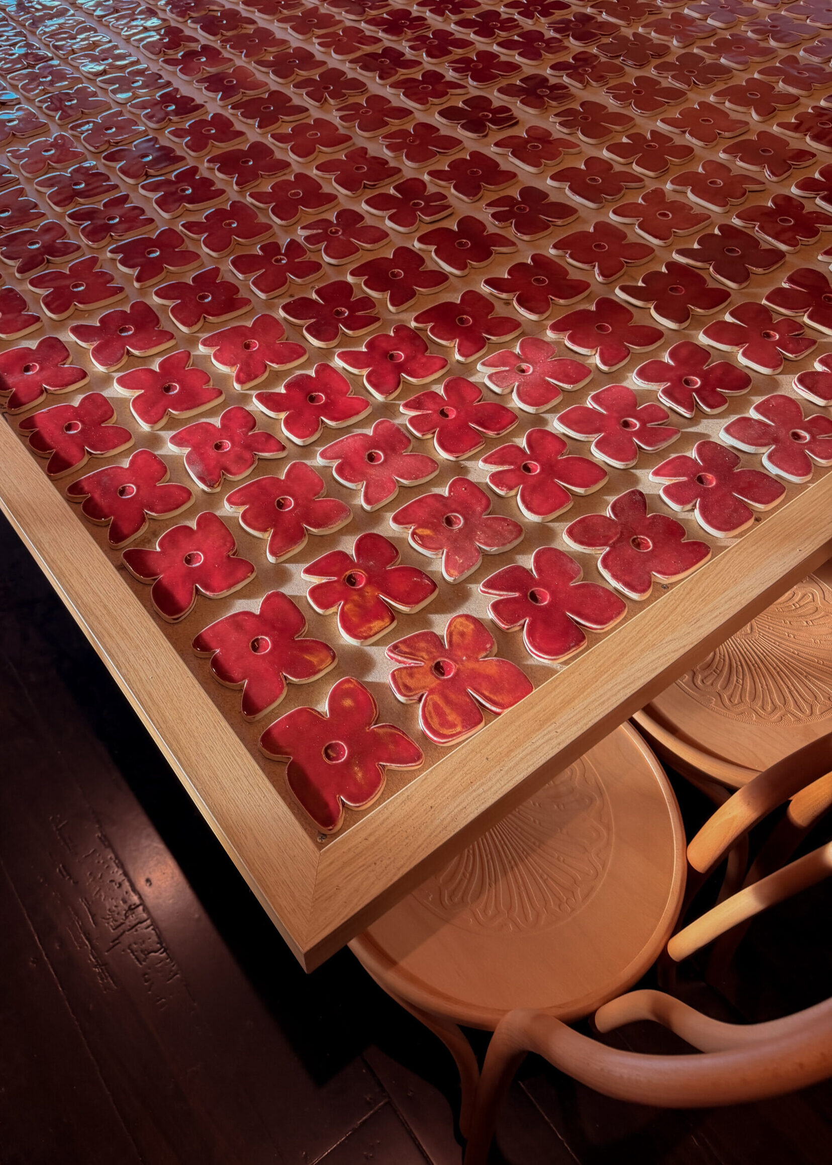 Custom tiled table detail at Eddies café designed by More Atelier.